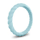 Light blue silicone stackable band ring with a twisted design on white background
