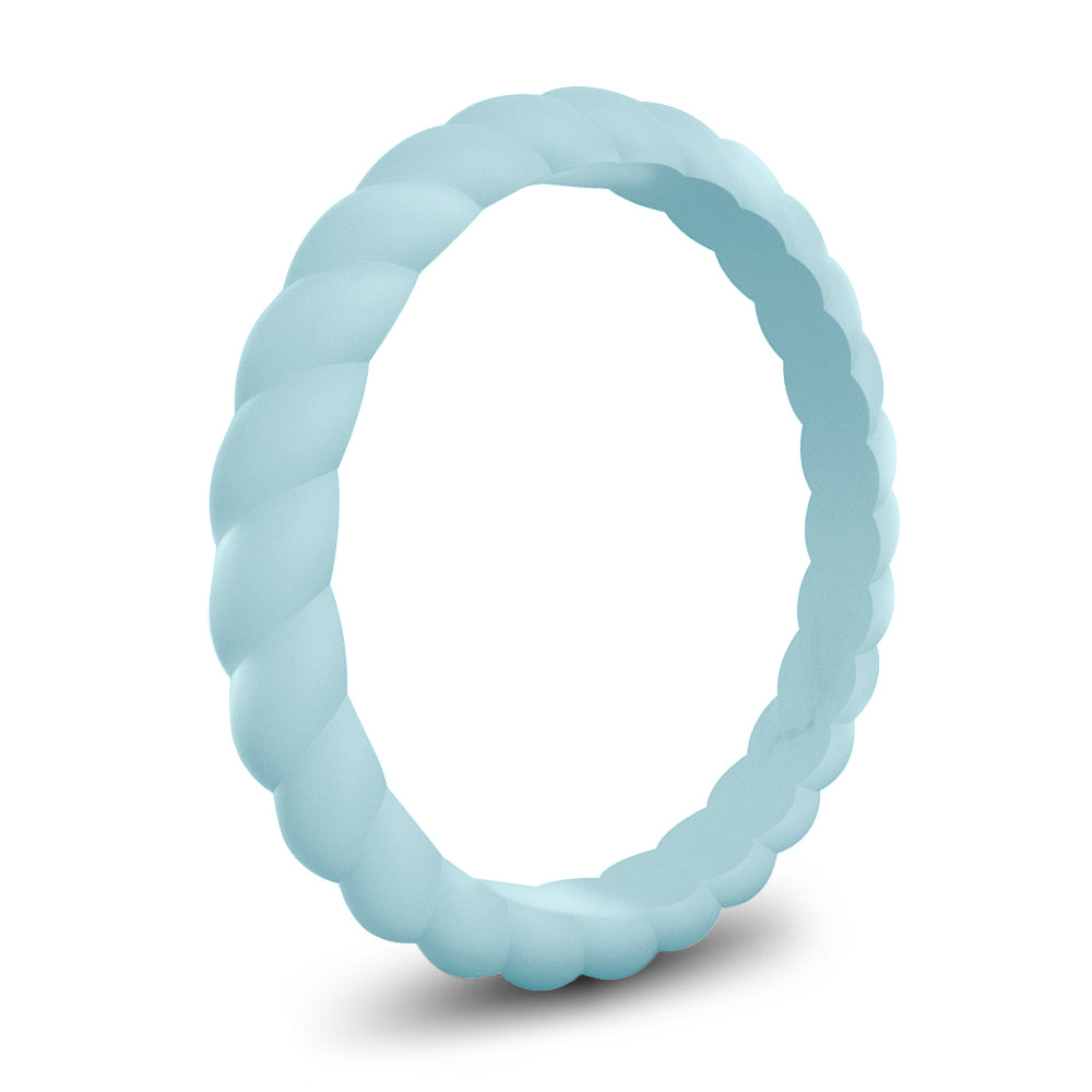 Light blue silicone stackable band ring with a twisted design on white background