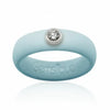 Powder blue silicone ring with a single clear gemstone set in silver bezel, branded Gemsique