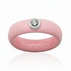 Sakura pink silicone ring with a single round clear gemstone set in silver bezel